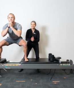 squat exercise on clinical pilates reformer